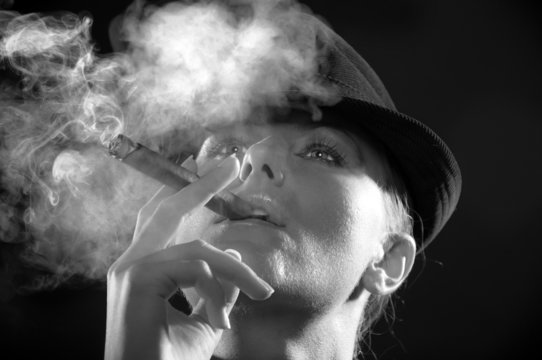 woman smoking cigar