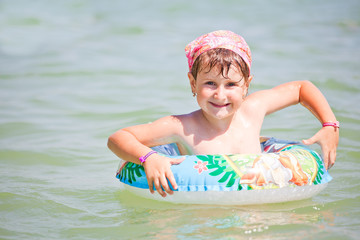 Little girl swimming