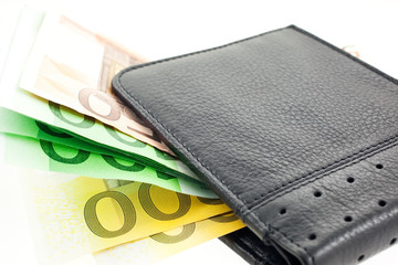black leather wallet with euro notes. horizontal shot