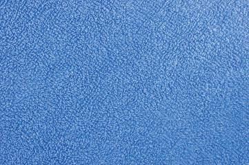 Blue plush terry cloth turkish bath towel macro background