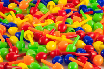 Fototapeta na wymiar Tacks Colored Toy