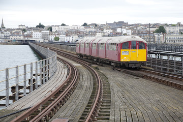 Fototapeta premium Train on Ryde Pier in the Isle of Wight, Hampshire, UK