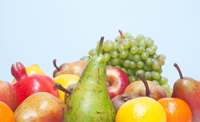 Fresh fruits on a blue background