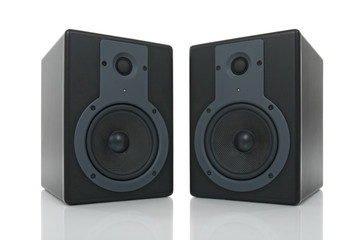 Obraz premium Pair of loud speakers with reflection