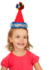 Joyful child in the New Year's cap.