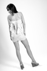 Naklejka premium back of white young woman presenting eco collection