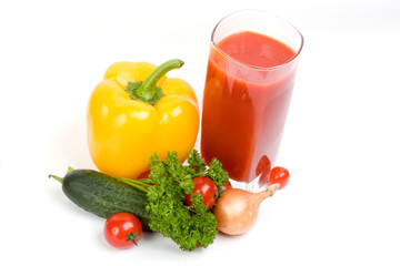 Tomatoes and juice on a white background