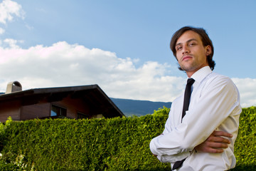 Young realtor with blue skies