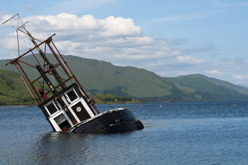 Partially submerged fishing vessel in Loch Linnie © Hugh McKean
