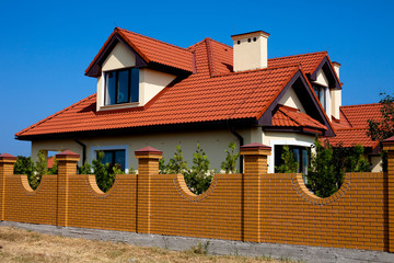Single family house with red roof