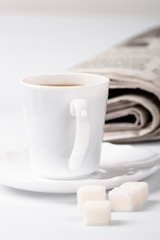 coffee, sugar and newspapers