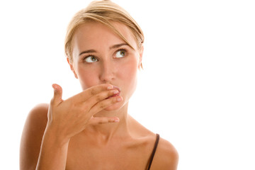 Woman licking fingers