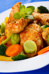 Roasted chicken meat with vegetable salad