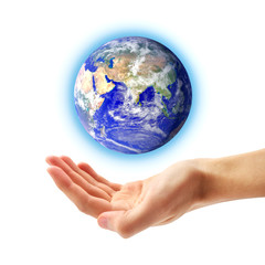 Planet Earth and human hand
