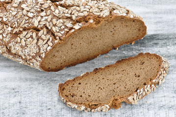 Wholegrain bread on wooden table, healty food