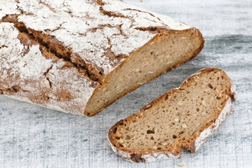 Wholegrain bread on wooden table, healty food