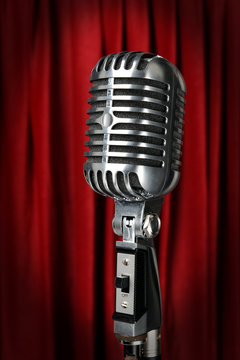 Vintage Microphone With Red Curtain