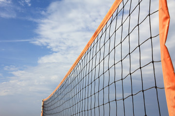 Fototapeta na wymiar pomarańczowy siatkówka plażowa net