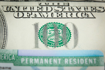 USA Permanent Resident card aka Green Card and paper money
