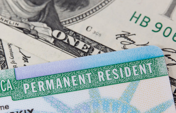 USA Permanent Resident card aka Green Card and paper money