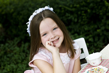 Little Girl Having Tea Party