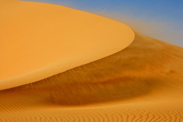 Wind blowing on a dune in the Empty Quarter