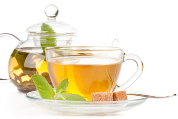 Teapot and cup of tea  with mint.