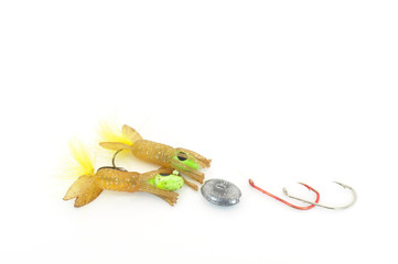 fishing lures with sinker and hooks isolated on white