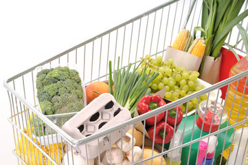 Close up of shopping trolley full of grocery.