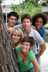 Group of happy students in a park