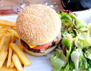 American cheese burger with fresh salad