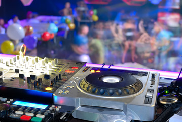 DJ's deck abothe the dancefloor