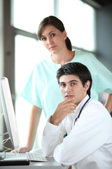 closeup of doctor and nurses in a meeting