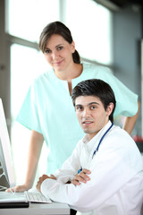 closeup of doctor and nurses in a meeting