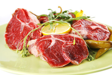 fresh beef medallion on green