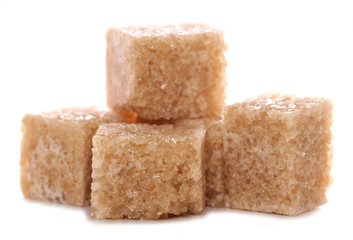 pile of brown demerara sugar cubes