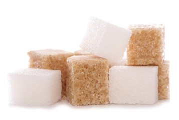 Mixture of brown and white sugar cubes
