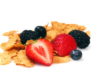 Bran cereal with blueberries, strawberries and blackberries