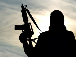 Silhouette of man against cloudy sky