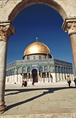 The afternoon sun shines on the golden Dome of the Rock