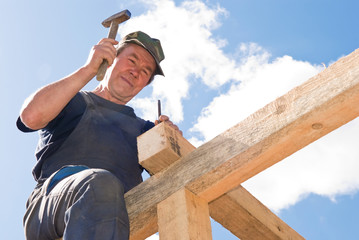 roofing works with hammer