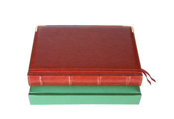 Expensive two leather notebooks on a white background