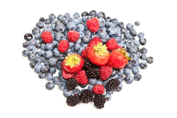 Composition of ripe black and red raspberries, strawberries and