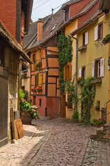 Fototapeta na wymiar Timbered houses in the village of Eguisheim in Alsace, France