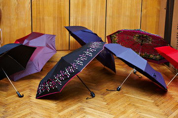 Umbrellas are dried after rain