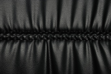 Stitch and wrinkle of black leather surface - 25572677