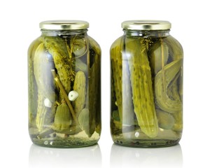 Glass jars with pickled cucumbers