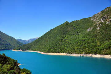 Fototapeta na wymiar Blue lake in mountains