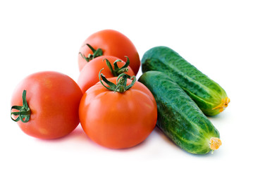 red tomatoes and green cucumbers