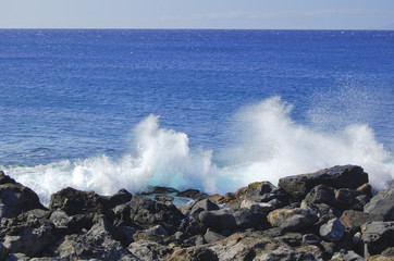 Breaking surf  on the coast of the Big Island Hawaii
